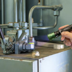 Industrial leak detection kits use fluorescent dye to determine the location of hydraulic fluid leaks.