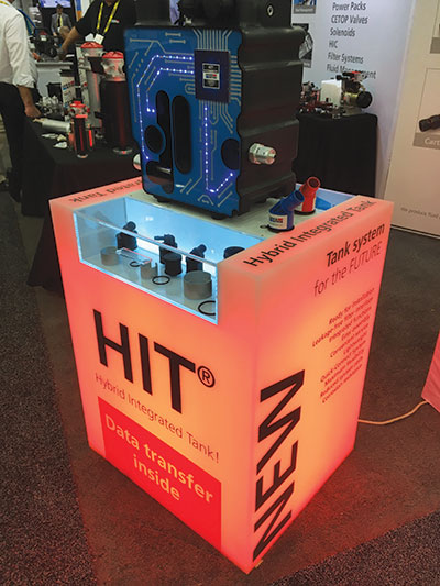 At the recent ICUEE Show in Louisville, Ky., ARGO-HYTOS exhibited a HIT equipped with three sensors integrated into the tank to demonstrate data collection from the hydraulic fluid for oil condition monitoring. For display purposes, LEDs visualized data flow from the tank to a controller. 